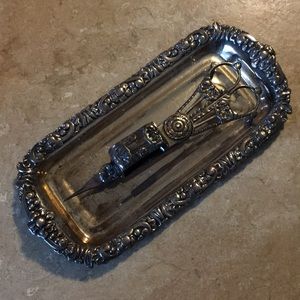 Silver candle sniffer and trimmer